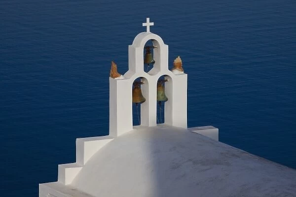 Greece, Santorini. Bell tower and church in neighborhood of Imerovigli