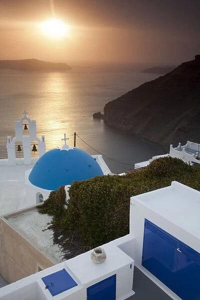 Greece, Santorini, Blue Dome and Bell Tower at Sunset