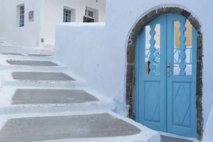 Framed Print : Greece, Santorini. Blue door livens up a quiet alley of white-washed homes in Pyrgos Framed Print : Greece, Santorini. Blue door livens up a quiet alley of white-washed homes in Pyrgos