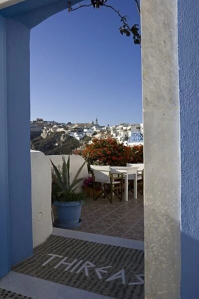 Greece, Santorini. Doorway to balcony tables at Thireas Restaurant