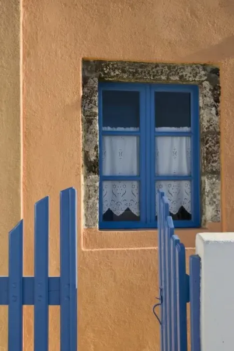 Framed Print : Greece, Santorini. Open blue gate and window in orange wall Framed Print : Greece, Santorini. Open blue gate and window in orange wall