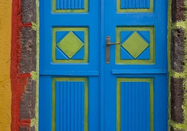 Greece, Santorini, Thira, Oia. Blue and lime green door colors