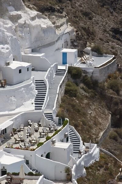 Greece, Santorini, Thira, Oia. Stairs connecting different levels of a large white