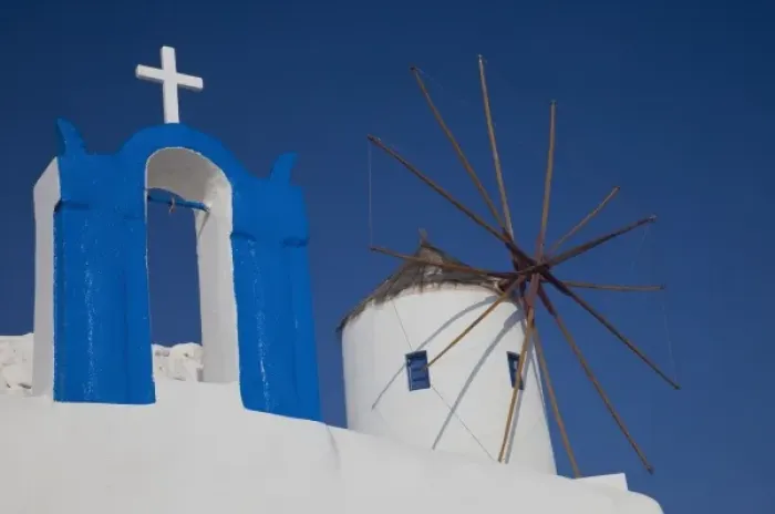 Framed Print : Greece, Santorini. Town of Oia and small bell tower with windmill Framed Print : Greece, Santorini. Town of Oia and small bell tower with windmill