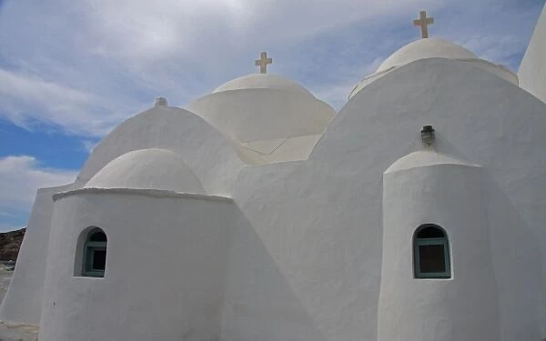 Greece, Sifnos, Vathi. Dramatic light on rear of traditional Greek Orthodox church