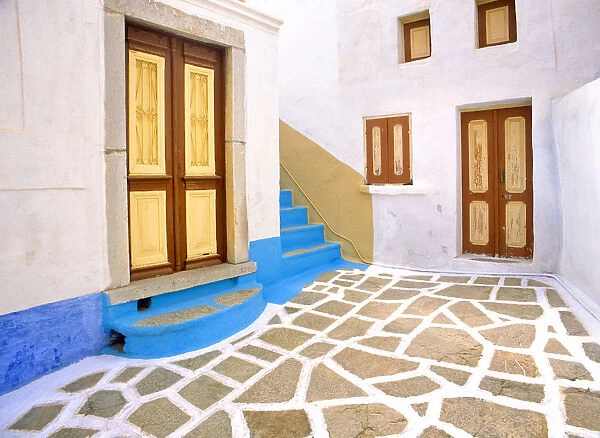 Greece, Symi. Doors to courtyard and stairway of house