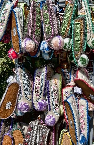 Greek souvenir shoes on rack in downtown shopping area of Plaka, Athens, Greece