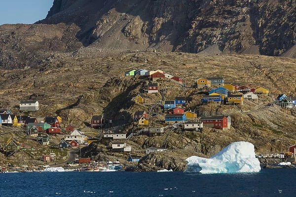 Greenland, Uummannaq. Colorful houses dot the rocky landscape