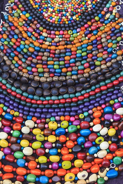 Group of beaded necklaces for sale at an antique market