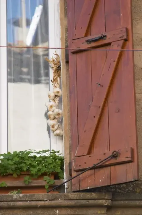 Framed Print : Gruissan village. La Clape. Languedoc. Window. String of garlic hanging in a window to dry Framed Print : Gruissan village. La Clape. Languedoc. Window. String of garlic hanging in a window to dry