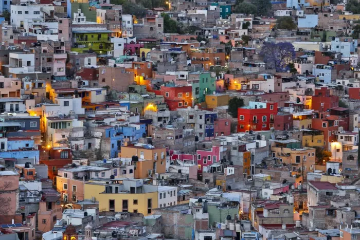 Framed Print : Guanajuato in Central Mexico. City overview in evening light with colorful buildings Framed Print : Guanajuato in Central Mexico. City overview in evening light with colorful buildings