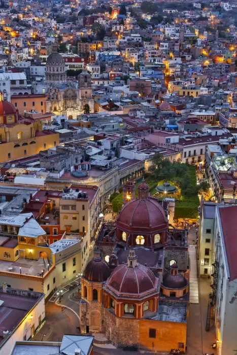 Framed Print : Guanajuato in Central Mexico. City overview in evening light with colorful buildings