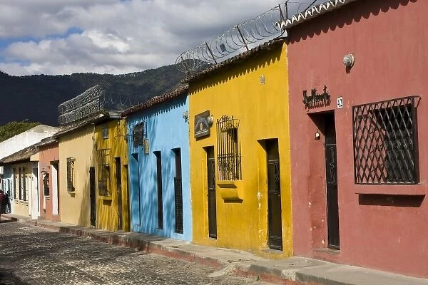 Guatemala, Antigua. Colorful houses along the town of Antigua