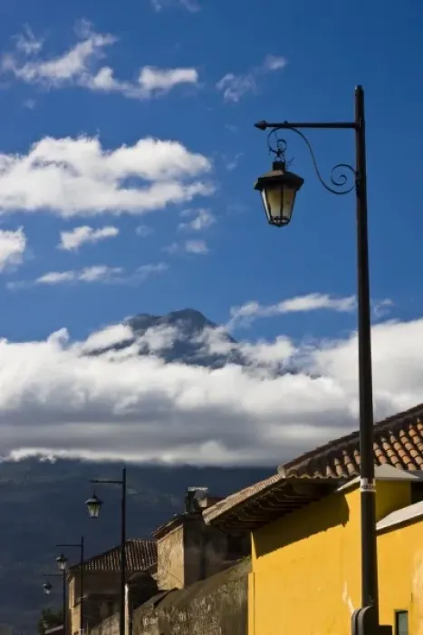 Framed Print : Guatemala, Antigua. Lamp post with Volcano Agua in background covered with clouds Framed Print : Guatemala, Antigua. Lamp post with Volcano Agua in background covered with clouds
