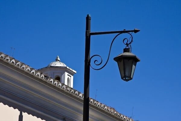 Guatemala, Antigua. Ornate lamppost in the streets of Antigua