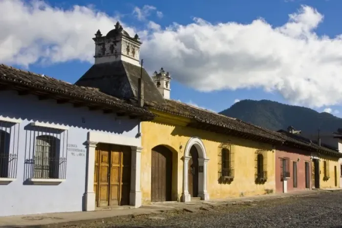 Framed Print : Guatemala, Antigua. A typical colorful street in Antigua