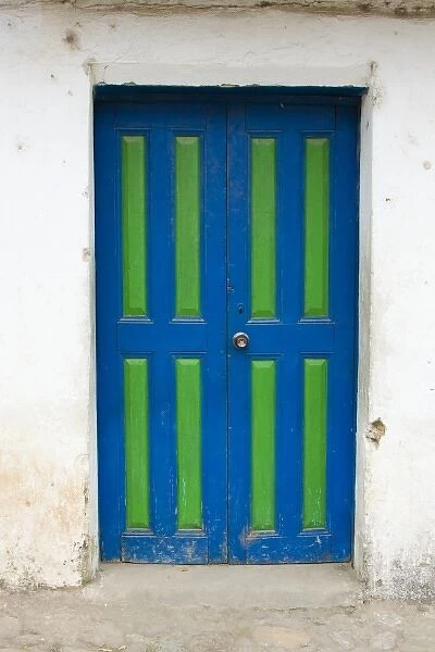 Guatemala, Chichicastenango. Bright colored doors in the town of Chichicastenango