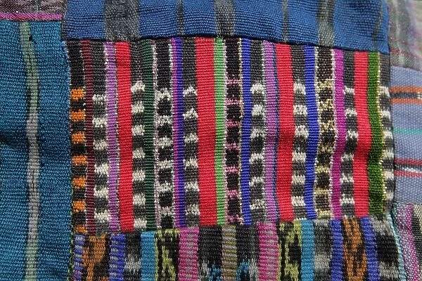 Guatemala. Typical Guatemalan textile; fabric scraps of various colors and textures forming a quilt