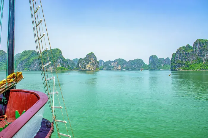 Framed Print : Ha Long Bay, Vietnam. Wide angle landscape view of hotel boat among limestone karsts and islets of the UNESCO Heritage Site