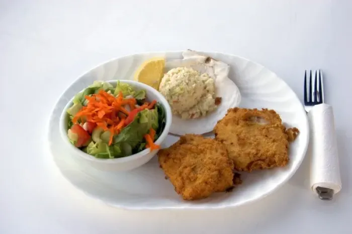 Framed Print : Haddock fish dinner served in restaurant at Halls Harbor, Nova Scotia, Canada
