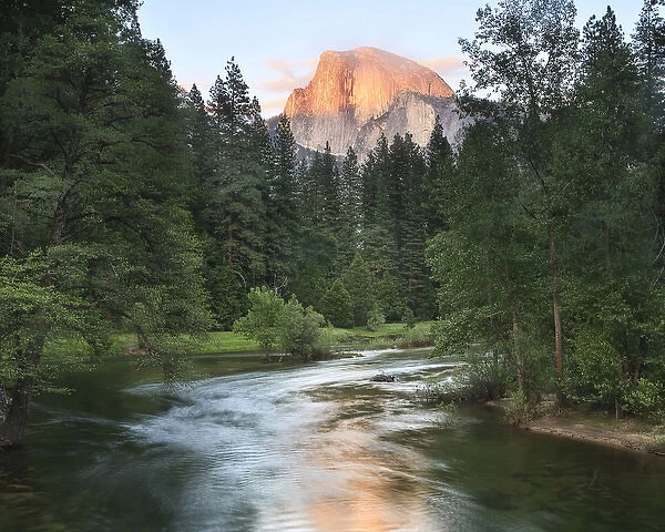 Half Dome with Sunset over Merced River. Yosemite, California, US
