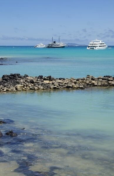 Harbor with blue water and boats and sun Santa Cruz Galapagos Islands Ecuador South