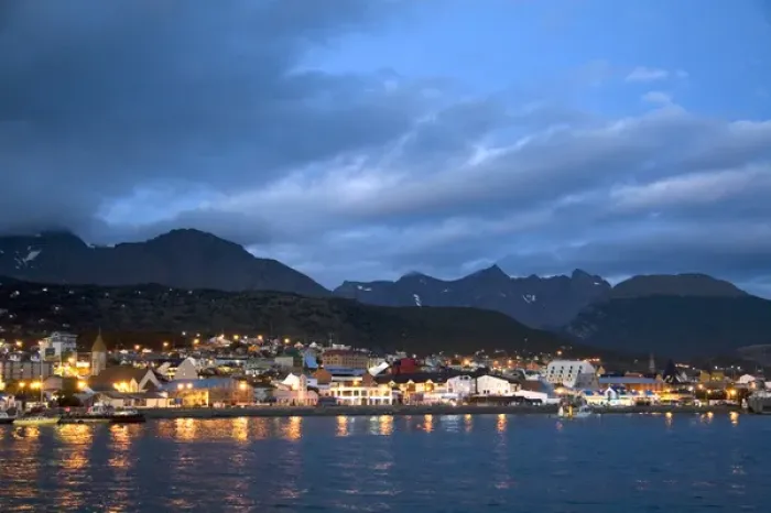 Framed Print : The harbor and city of Ushuaia at dusk on the island of Tierra del Fuego, Argentina