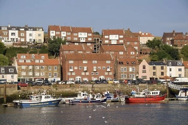 Harbor with fishing boats in the Harbor of beautiful tourist town of Whitby England