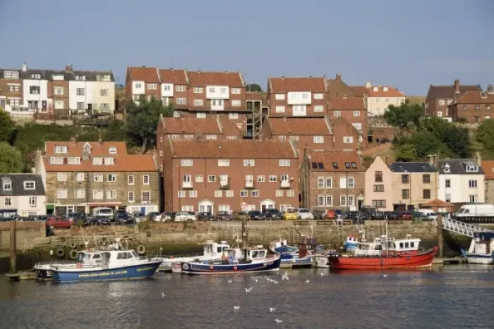 Framed Print : Harbor with fishing boats in the Harbor of beautiful tourist town of Whitby England Framed Print : Harbor with fishing boats in the Harbor of beautiful tourist town of Whitby England