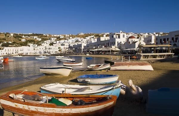 The harbor town with colorful fishing boats moored at the small harbor, Mykonos