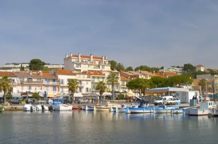 Framed Print : The harbour with boats and buildings along the water in Bandol Bandol Cote d Azur