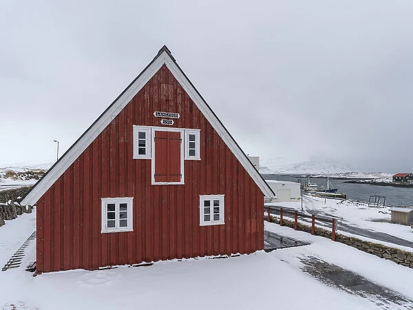 The harbour of the fishing village Djupivogur in the eastern fjords during winter in Iceland