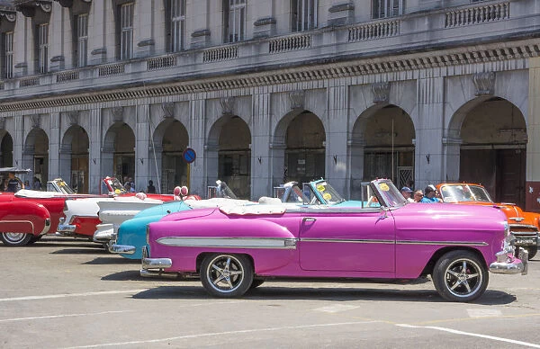 Havana Cuba Habana central colorful old classic 1950s cars on display near Capital
