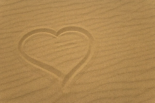 Heart outline drawn in sand. Credit as: Don Paulson  /  Jaynes Gallery  /  DanitaDelimont