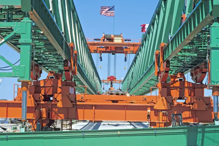 Framed Print : Heavy equipment used for building a bridge Framed Print : Heavy equipment used for building a bridge