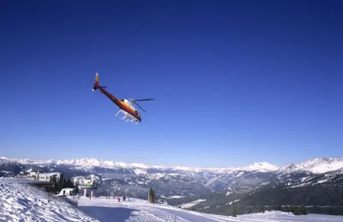 Framed Print : Helicopter skiing at famous ski town of Whistler in British Columbia Canada Framed Print : Helicopter skiing at famous ski town of Whistler in British Columbia Canada
