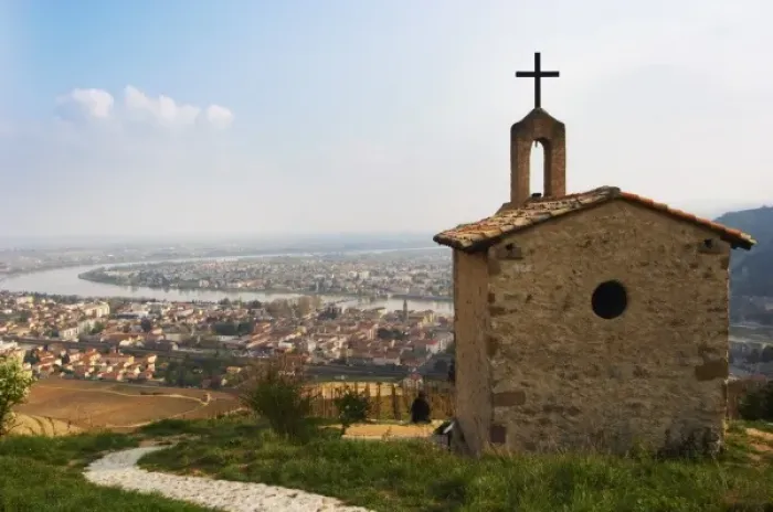 Framed Print : The Hermitage chapel on top of the hill with a view across the river on Tournon