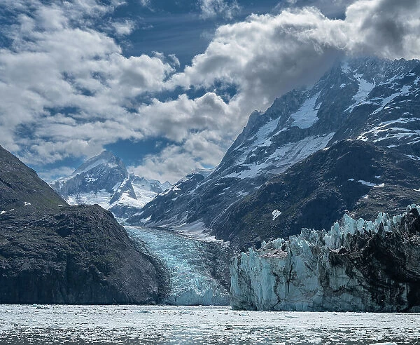 High mountains surrounding Johns Hopkins Inlet generate numerous glaciers