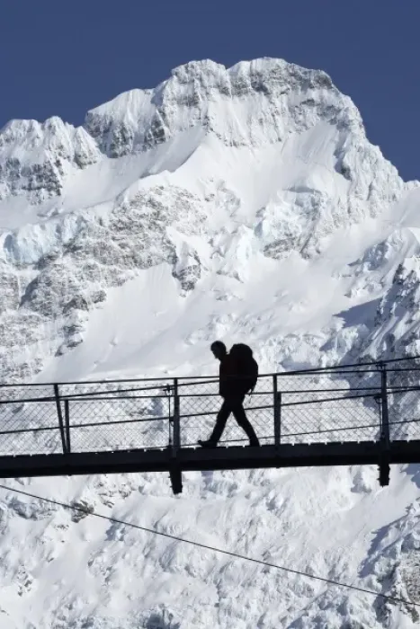Framed Print : Hiker on Hooker River Footbridge & Mt Sefton, Aoraki / Mt Cook National Park, Canterbury Framed Print : Hiker on Hooker River Footbridge & Mt Sefton, Aoraki / Mt Cook National Park, Canterbury