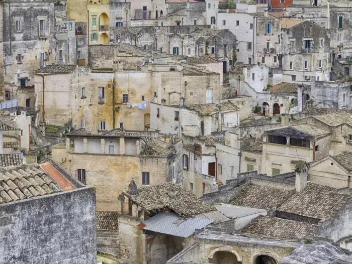 Framed Print : Historic cave dwellings, called Sassi houses, in the village of Matera