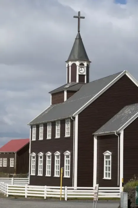 Framed Print : Historic seaside church in quaint hamlet of Vik, Iceland