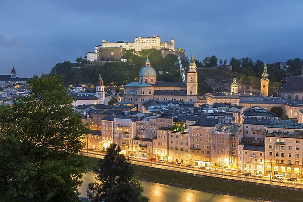The Hohensalzburg Fortress; cathedral, (Dom) at dusk; Salzburg; Austria