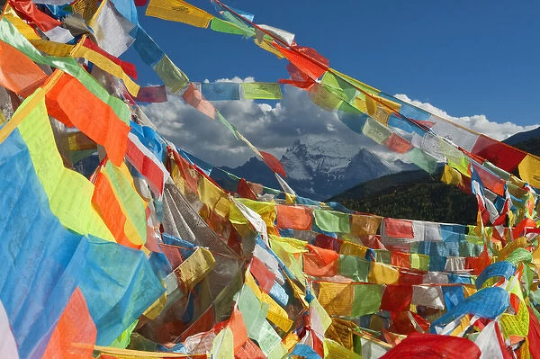 One of Three Holy Peaks of Yading Nature Reserve surrounded by Prayer Flags, Sichuan