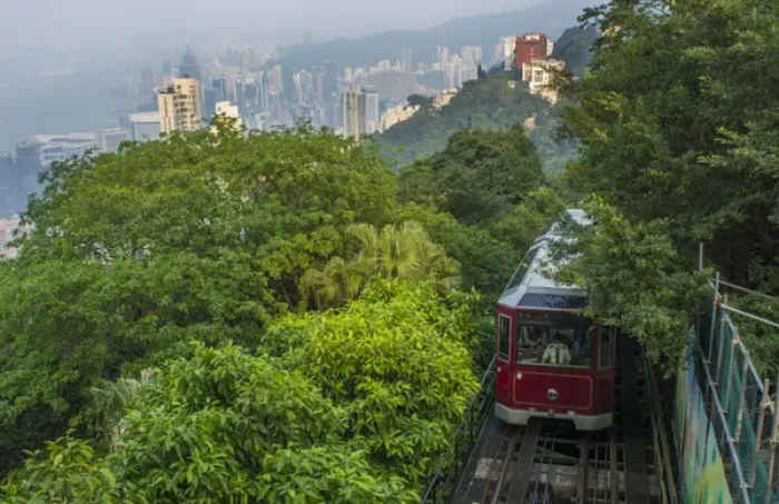 Framed Print : Hong Kong China Victoria Peak Tram going down mountain on smoggy hazy foggy day with
