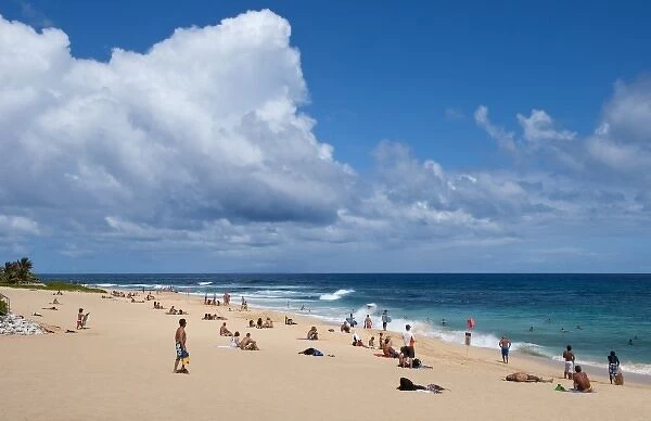 Honolulu, Hawaii. People on white sand of Sandys Beach Park in Oahu