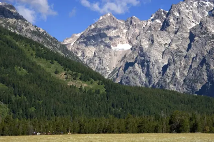 Framed Print : Horseback riding in Grand Teton National Park, Wyoming beneath Mt. Moran