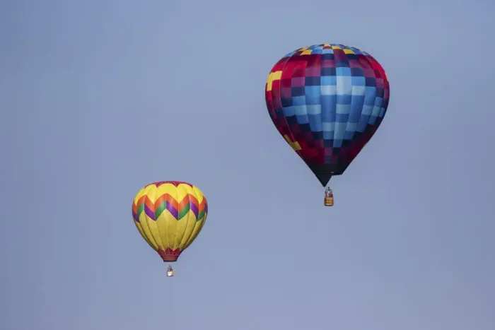 Framed Print : Hot air balloon bringing color to the sky