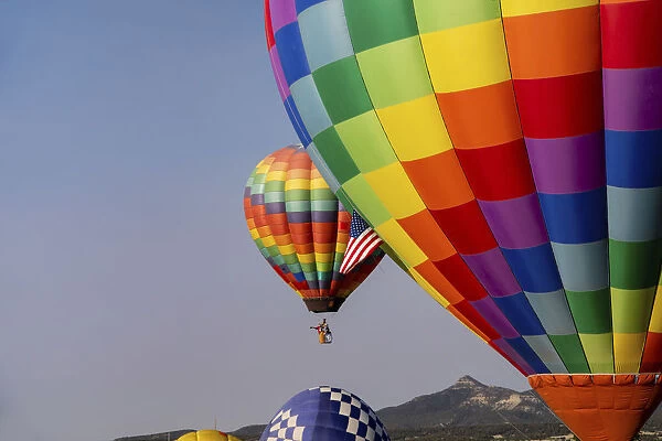 Hot air balloon bringing color to the sky. (Editorial Use Only)