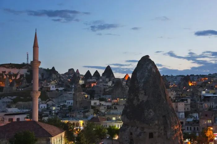 Framed Print : Houses and churches carved into the rock formations, Goreme, Cappadocia, Turkey
