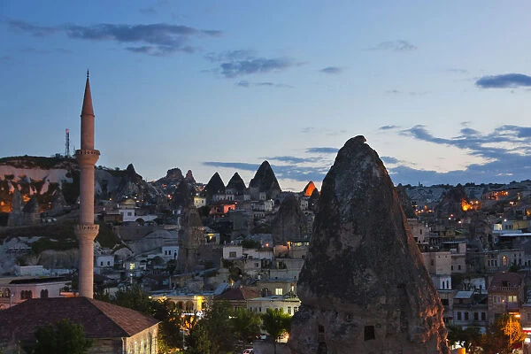 Houses and churches carved into the rock formations, Goreme, Cappadocia, Turkey